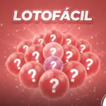 Composição da Lotofácil mostrando um monte de esferas vermelhas e uma esfera central rosa, todas com pontos de interrogação, sobre um fundo avermelhado com confetes.