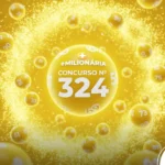 Arte digital em amarelo ouro com partículas brilhantes formando um halo. A esfera central exibe o nome "+MILIONÁRIA" e "CONCURSO Nº 324". Logotipo CenárioMT no canto inferior direito.