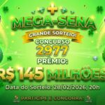 Cartaz da Mega-Sena, concurso 2977, destacando prêmio de 145 milhões de reais. Fundo verde com trevos de quatro folhas.