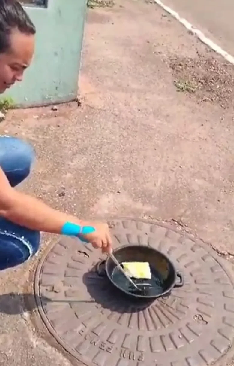 Moradora frita pastel na calcada apos cidade de Mato Grosso registrar 44°C