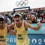 2024. 07. 27 - Jogos Olímpicos Paris 2024 - Volei de praia masculino - A dupla brasileira André (2) e George (1) estreia com vitória contra o Marrocos por 2 sets a 0 - Foto: Alexandre Loureiro/COB Por: Alexandre Loureiro/COB/Direitos Reservados