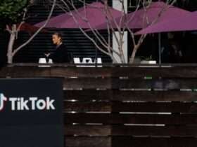 A person arrives at the offices of Tik Tok after the U.S. House of Representatives overwhelmingly passed a bill that would give TikTok's Chinese owner ByteDance about six months to divest the U.S. assets of the short-video app or face a ban, in Culver City, California, U.S., March 13, 2024.  REUTERS/Mike Blake