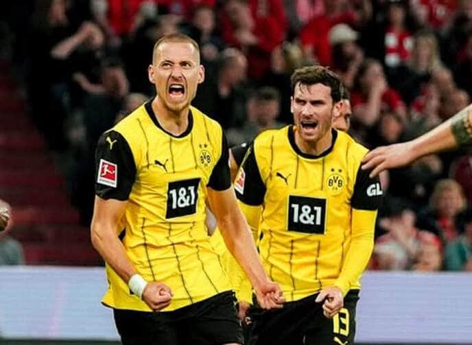 Borussia Dortmund x Barcelona AO VIVO: onde assistir, horário e escalações pela Champions League. Imagem: Divulgação Borussia Dortmund