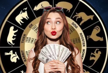 Horóscopo Chinês, mulher segurando dinheiro na mão