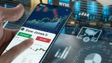 Celular com tela mostrando o mercado do Dow Jones hoje.