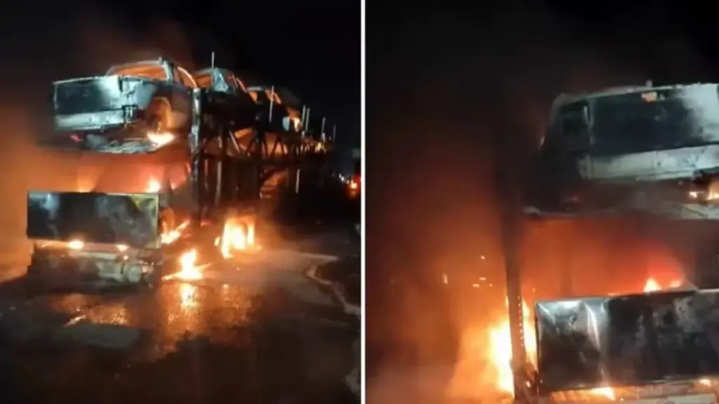 Caminhão-cegonha pega fogo e 11 carros são destruídos na BR-101, em Terra de Areia