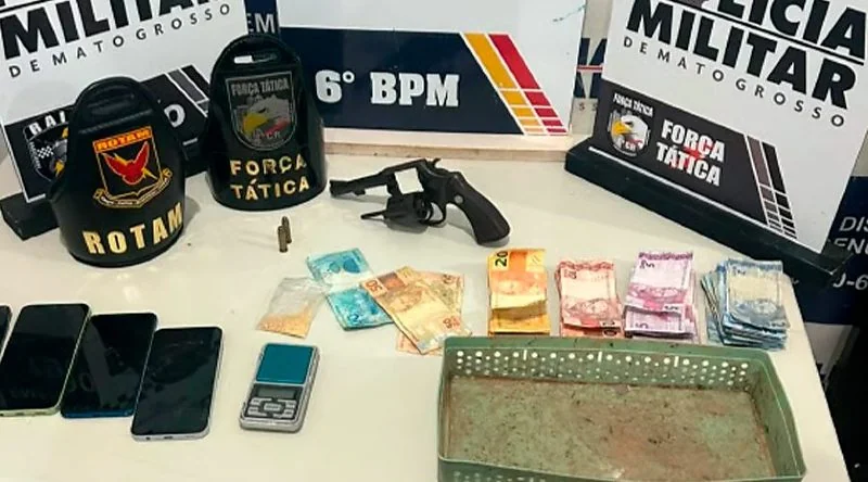 Arma, dinheiro e celulares apreendidos em Cáceres